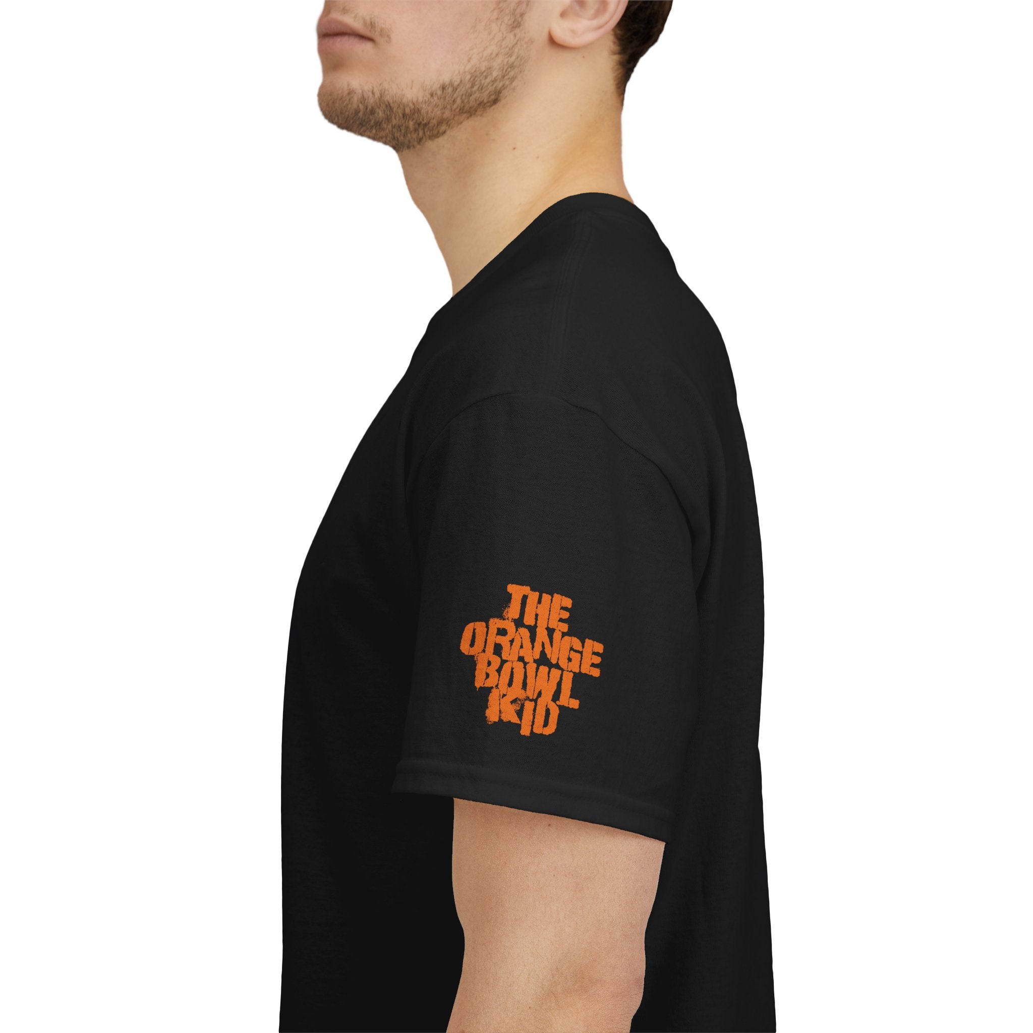 The Greatest Team, 2001 Miami Hurricanes Legacy Tribute Tee.

This unisex tee celebrates the legendary 2001 Miami Hurricanes. Designed by The Orange Bowl Kid, this shirt honors the team with a standout design. The back features bold, retro lettering, while the front showcases a roster of top players. This shirt is a must-have for any true fan, bringing back memories of that incredible season. Shown here is a close-up of the black shirt sleeve.