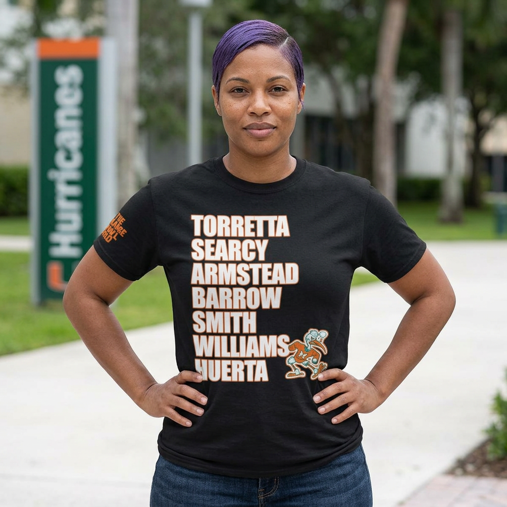 Celebrate the swagger and legacy of "The Ruthless Posse" with this premium tribute tee. This design honors the heavy hitters who defined a generation of greatness, featuring the iconic names that made the Orange Bowl the toughest place to play in the country. A person wearing a black t-shirt featuring a vertical list of iconic surnames—Torretta, Searcy, Armstead, Barrow, Smith, Williams, and Huerta—printed in white varsity-style lettering with orange outlines.