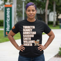 Celebrate the swagger and legacy of "The Ruthless Posse" with this premium tribute tee. This design honors the heavy hitters who defined a generation of greatness, featuring the iconic names that made the Orange Bowl the toughest place to play in the country. A person wearing a black t-shirt featuring a vertical list of iconic surnames—Torretta, Searcy, Armstead, Barrow, Smith, Williams, and Huerta—printed in white varsity-style lettering with orange outlines.