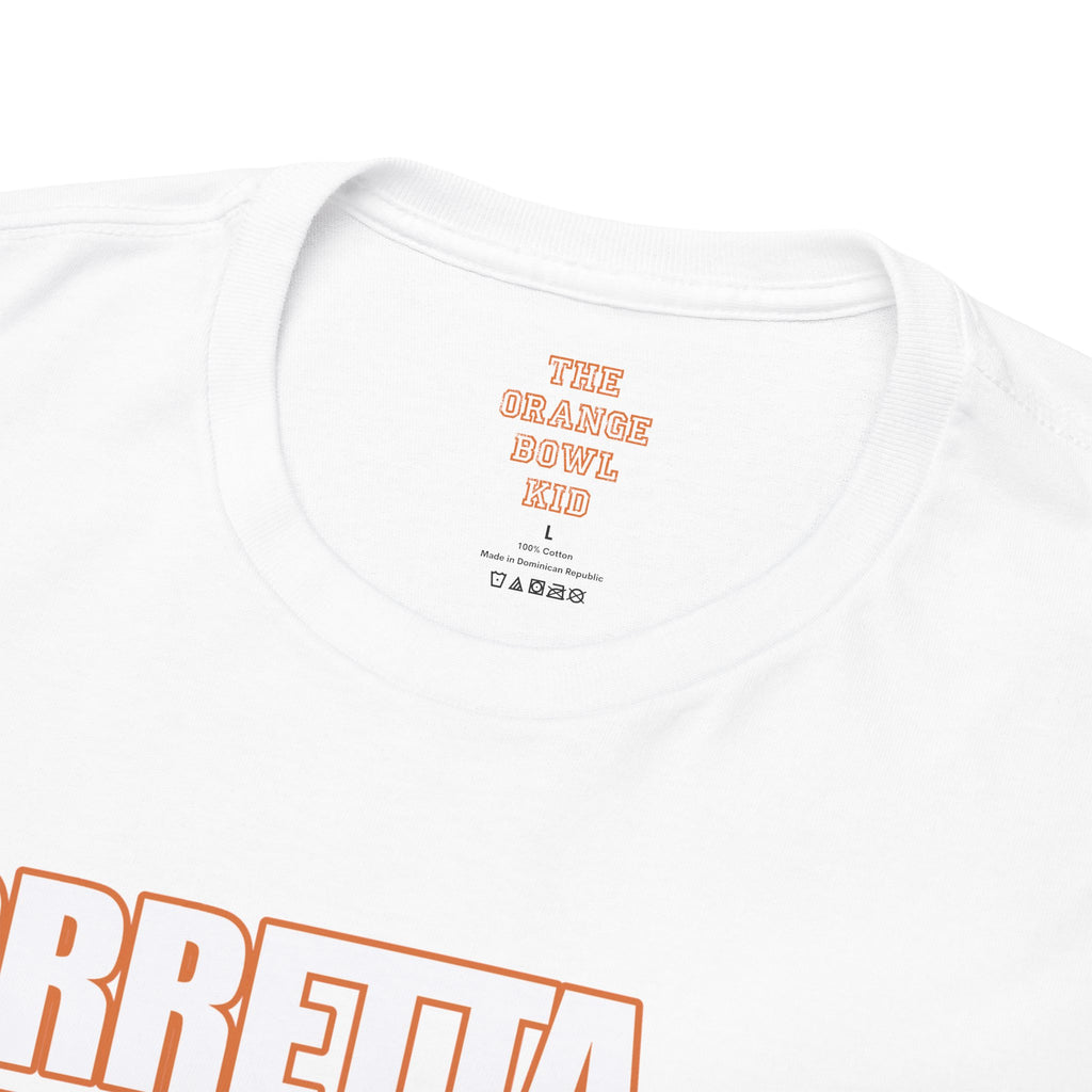 The Ruthless Posse 1991 Hurricanes Team Graphic Tee collar, showcasing a close-up detail, proudly represents the vintage sports spirit of The Orange Bowl Kid.