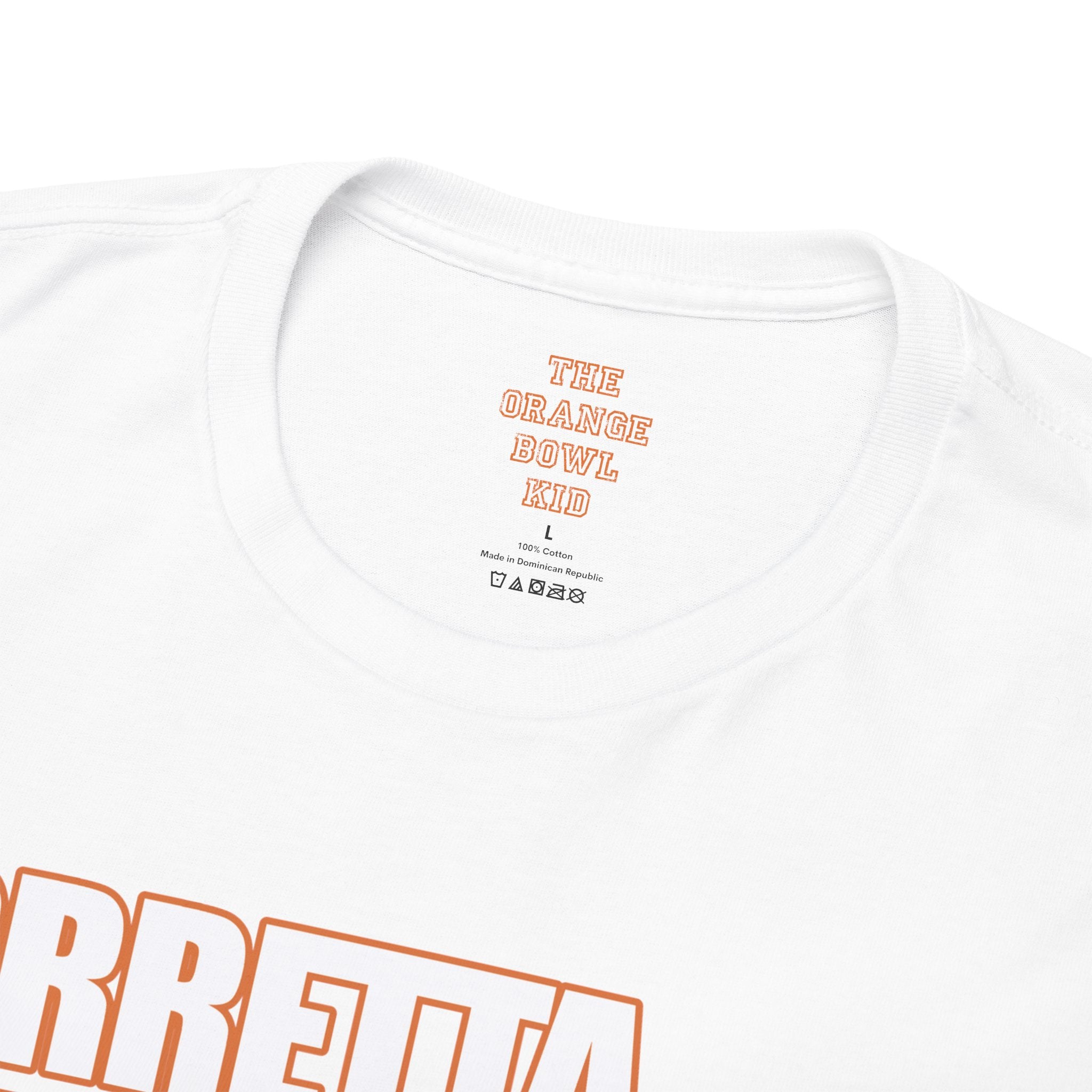 The Ruthless Posse 1991 Hurricanes Team Graphic Tee collar, showcasing a close-up detail, proudly represents the vintage sports spirit of The Orange Bowl Kid.